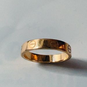Gold Cartier mini love ring